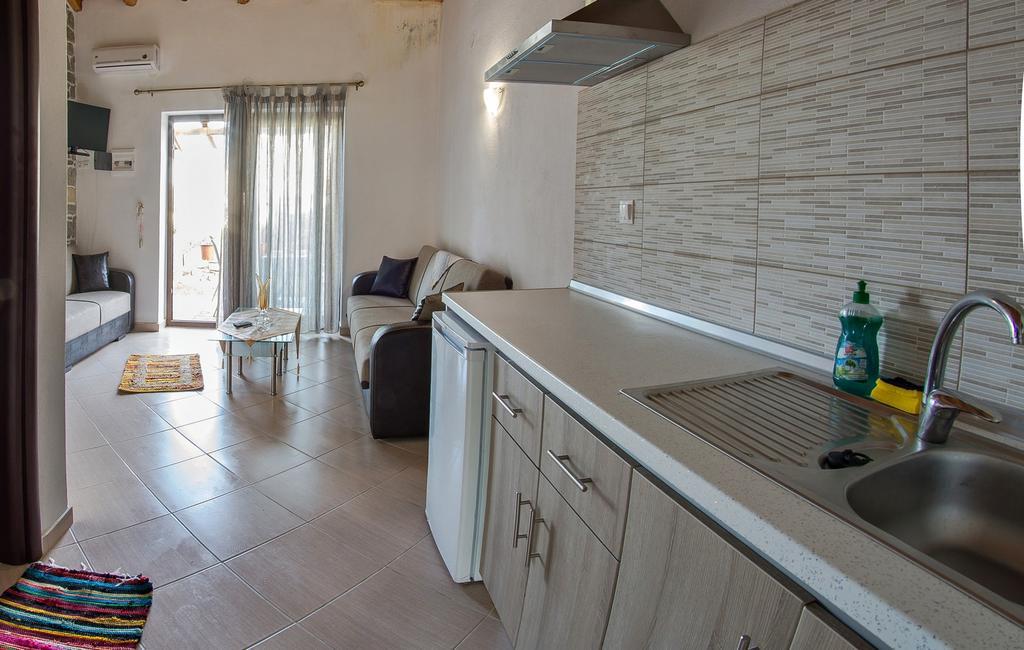 Theano Apartments Sarti Esterno foto